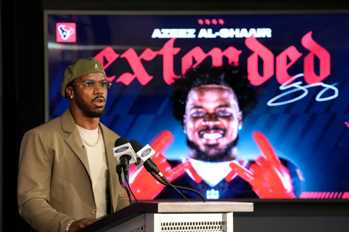 Houston Texans' Azeez Al Shaair talks about his contract extension during a press conference at the NFL football team's facility, Friday, May 1, 2026, in Houston