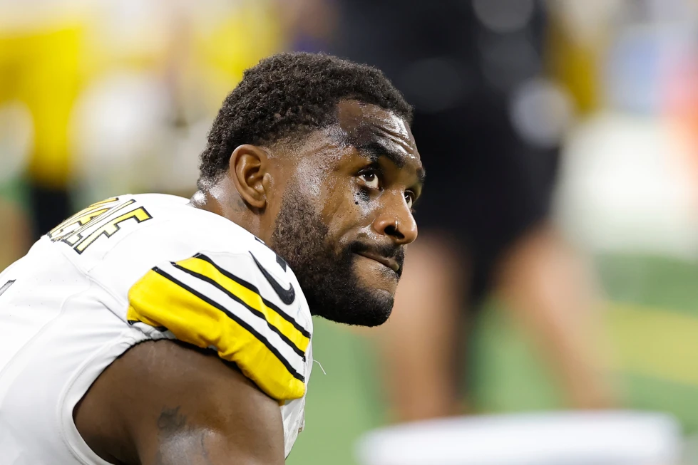 Pittsburgh Steelers’ DK Metcalf sits on the bench during the second half of an NFL football game against the Detroit Lions, Sunday, Dec. 21, 2025, in Detroit
